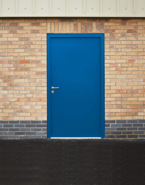 Steel personnel door for commercial building access